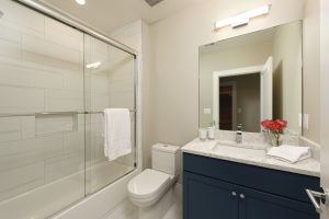 Meridian Homes - Custom Home Modern Bathroom - Blue Cabinetry