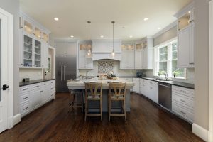 Meridian Homes - Custom Kitchen with Island and Stainless Steel Appliances