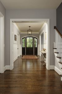 Meridian Homes - Foyer with hallway and custom front door