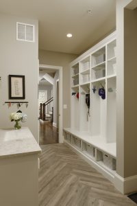 Meridian Homes - Mudroom with built-in lockers and storage