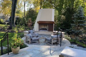 Outdoor Living Area with Contemporary Fireplace - Meridian Homes