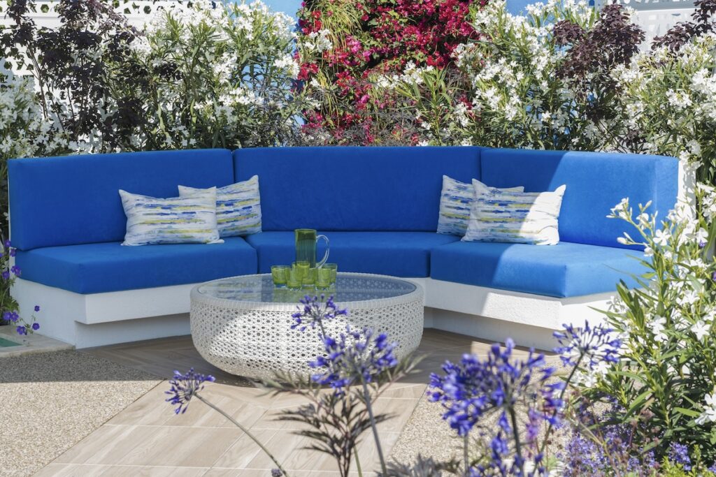 Outdoor living - armchairs and table set up in the garden